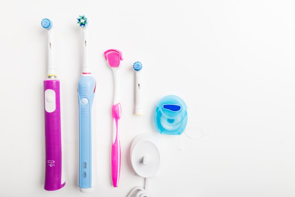 Electric toothbrushes on a counter